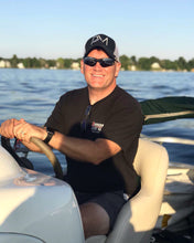 Load image into Gallery viewer, Tim Eggebraaten taking our hat for a cruise on the pontoon