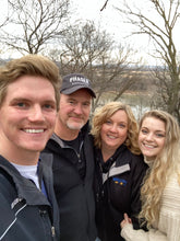 Load image into Gallery viewer, Luke, Todd, Rhonda, and Olivia on a walk in Nebraska! Todd is wearing our 2nd Edition Phaser Marketing Hat!