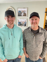 Load image into Gallery viewer, Clay and Todd Rasmussen wearing their new All Black Limited Edition PM Hats