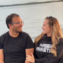Load image into Gallery viewer, Just two Lovebirds enjoying the sunset on the lake while Grace is wearing our phaser marketing sweatshirt