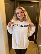 Load image into Gallery viewer, Olivia Eggebraaten trying on the first Phaser Space Crewneck
