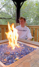 Load image into Gallery viewer, Brandon Bradbury - Graphic Designer at Phaser Marketing - Wearing his Phaser Space Crew by the fire