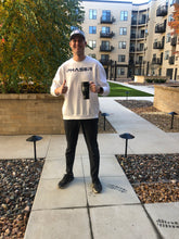 Load image into Gallery viewer, Evan Nelson ready to go for Phaser Friday! Evan is wearing our Phaser Space Crew, 3rd Edition Patch hat, and drinking out of our PM Mug!
