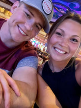 Load image into Gallery viewer, Lindsey and Dan enjoying a night out! Dan is wearing our 3rd Edition Patch hat!
